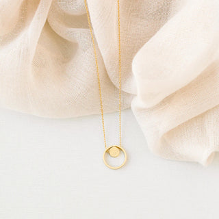 Gold Circle Andy Necklace at DLK